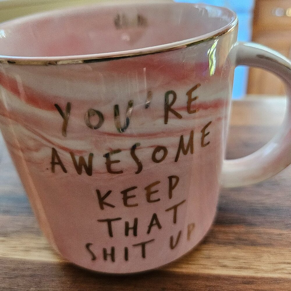 pink swirl cup with a attitude